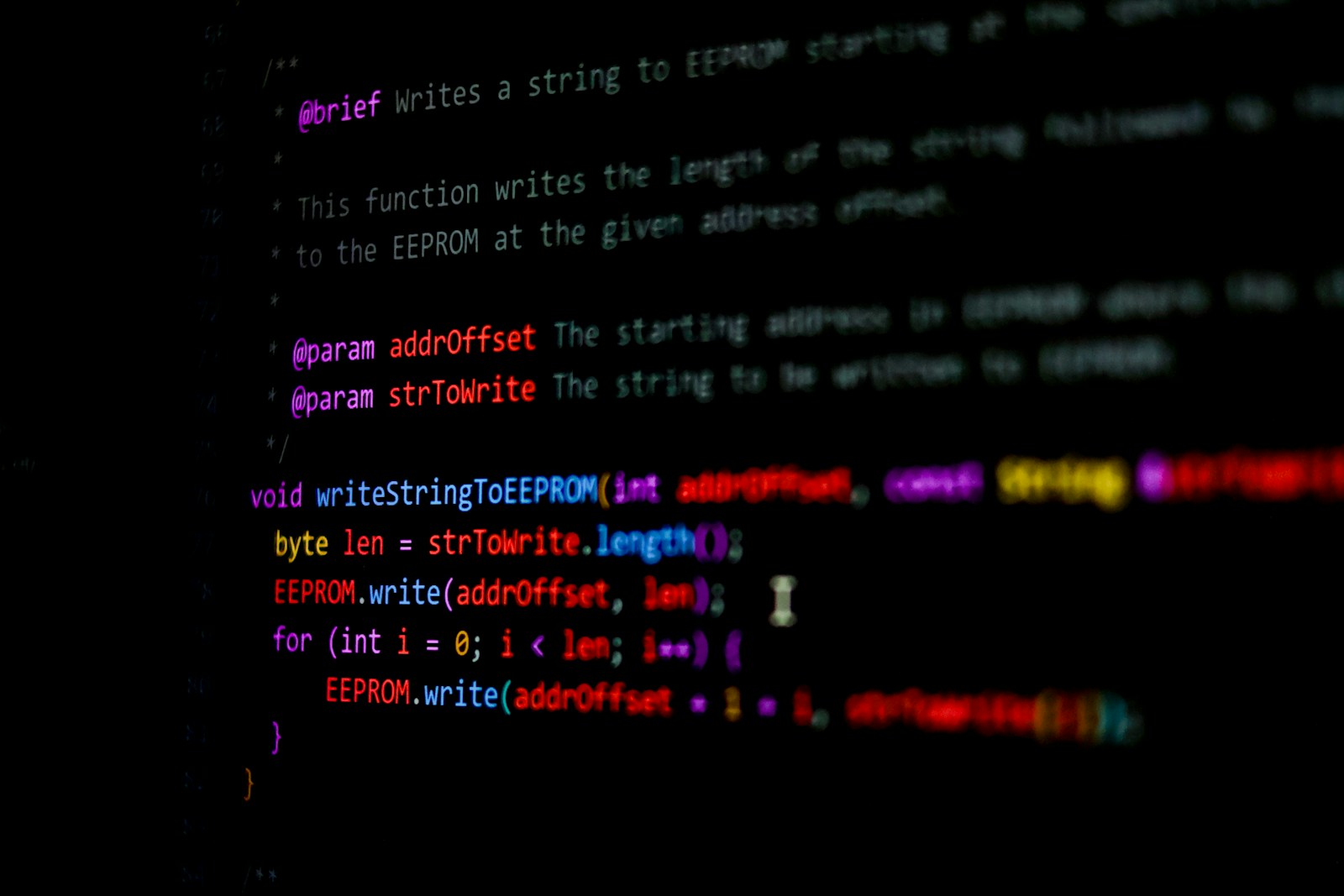 Code and software dashboards on computer screens